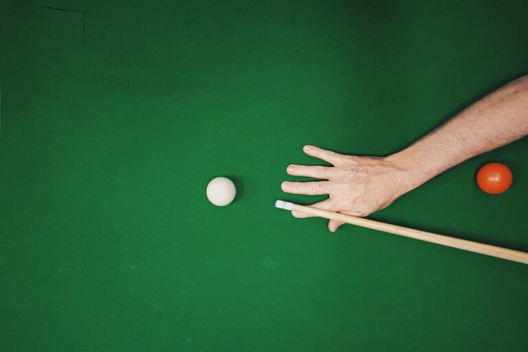 McDermott pool cue on green felt with billiard balls, illustrating cue shaft options